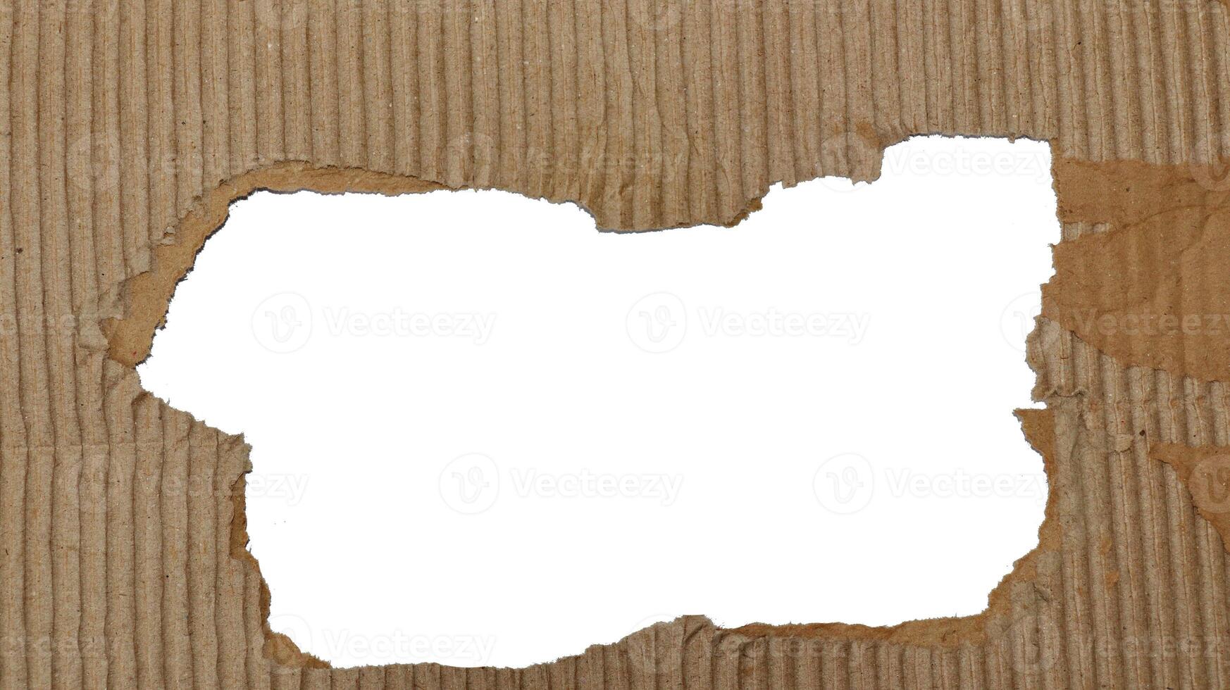 Torn Brown paper box texture or cardboard with torn for design background photo