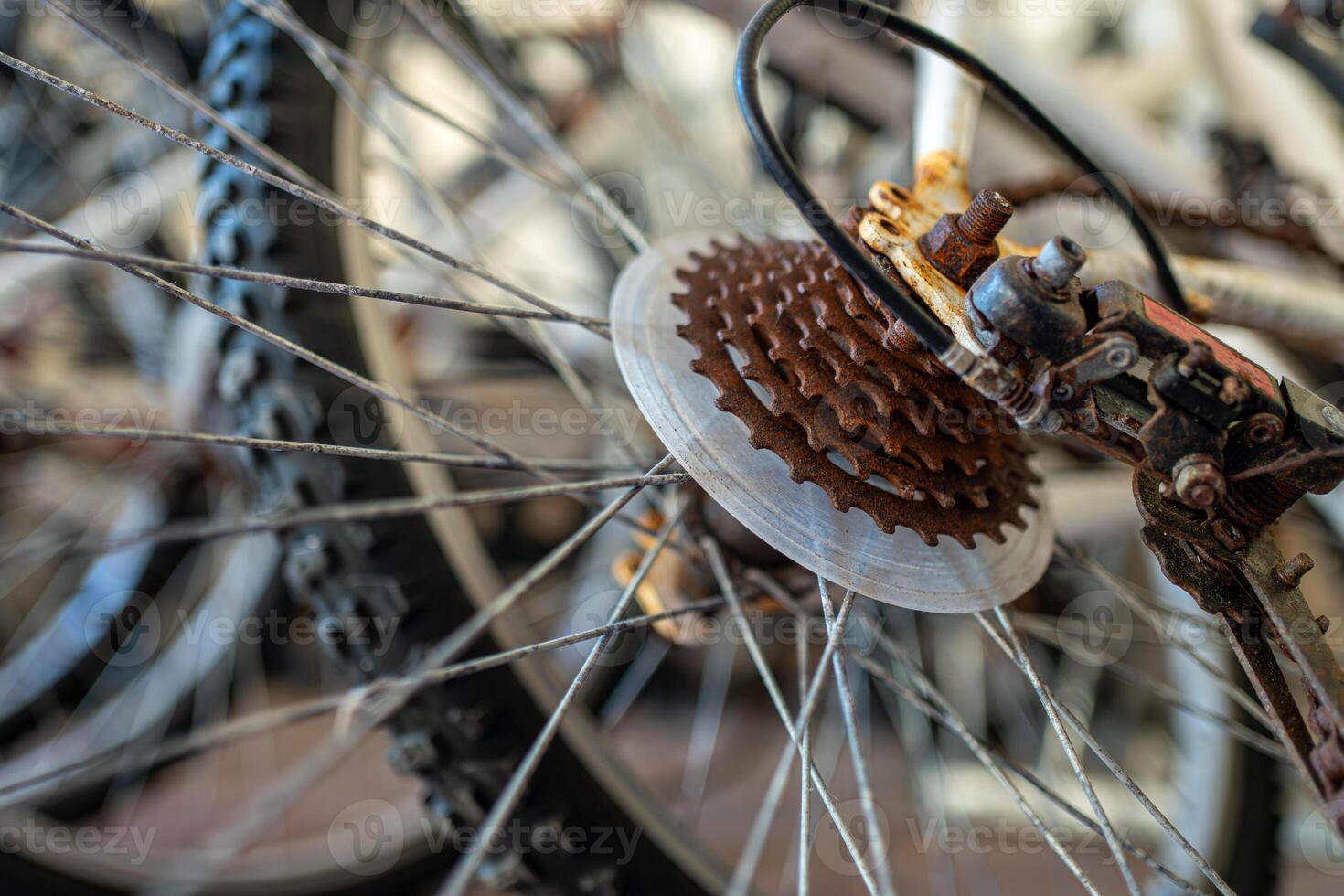 Rusty gears on bicycle tire closeup photo