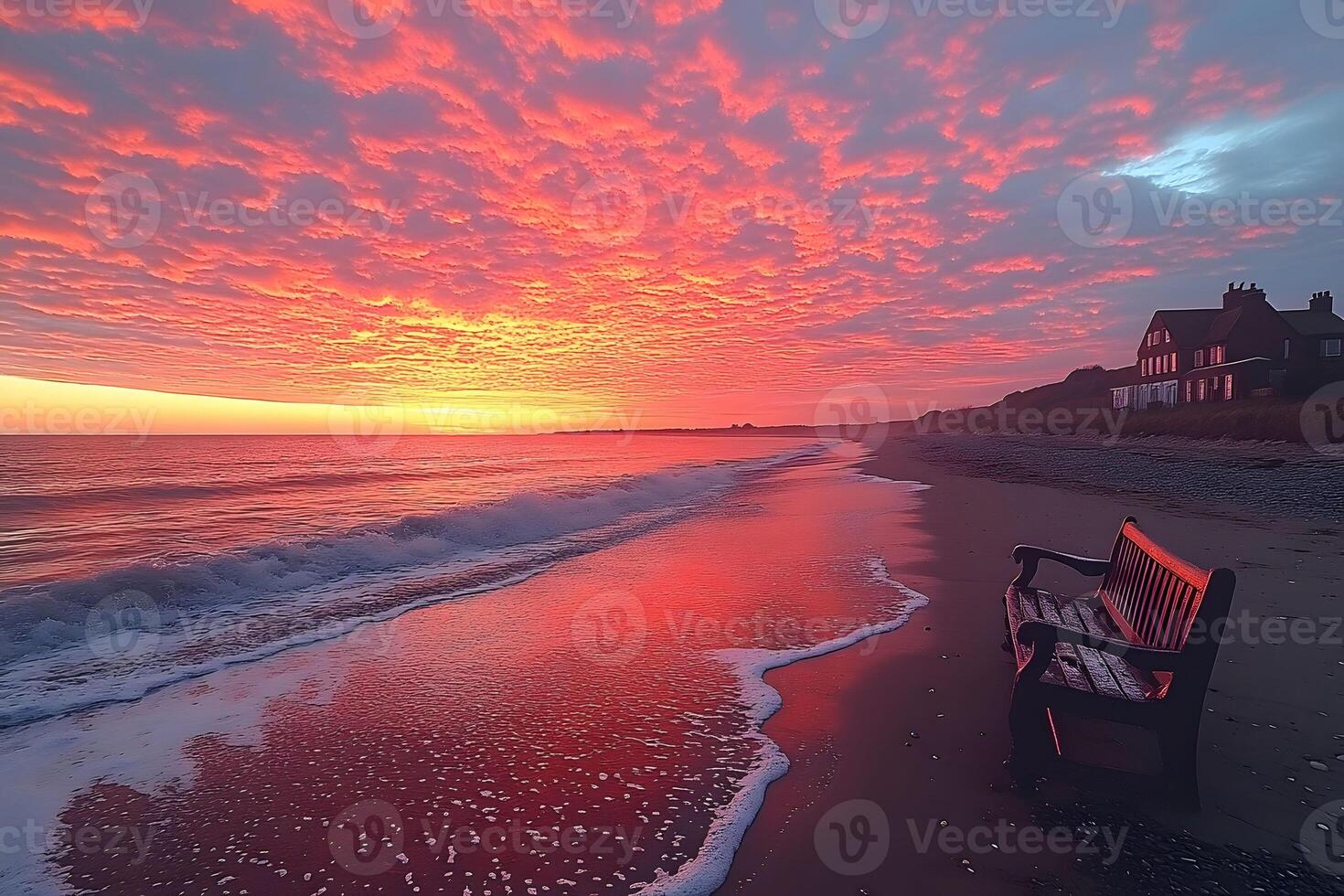 Stunning Coastal Sunset Over Sandy Beach with Vibrant Sky and Ocean Waves photo
