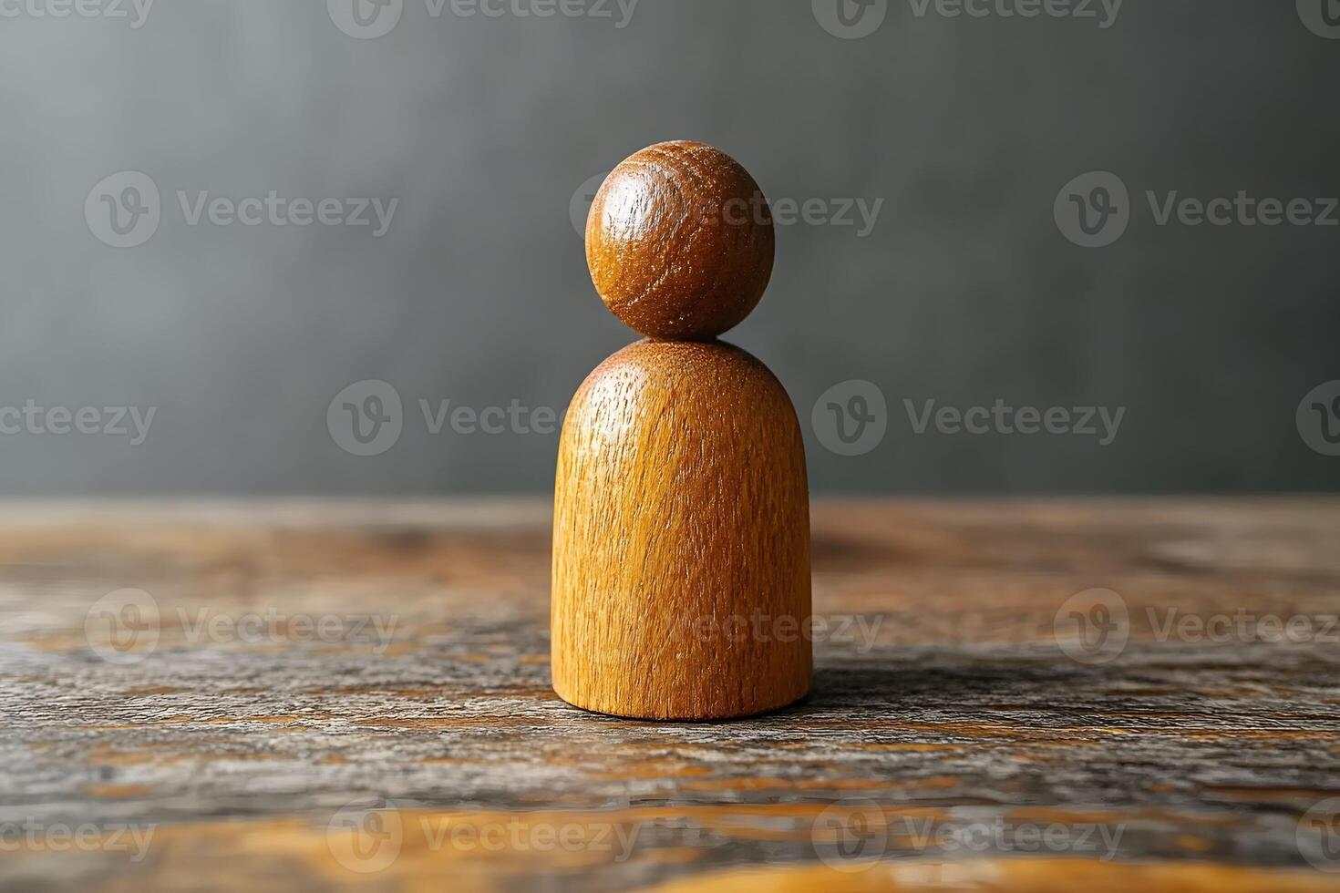 Minimalist Wooden Figurine on Rustic Wooden Surface for Design and Decor photo