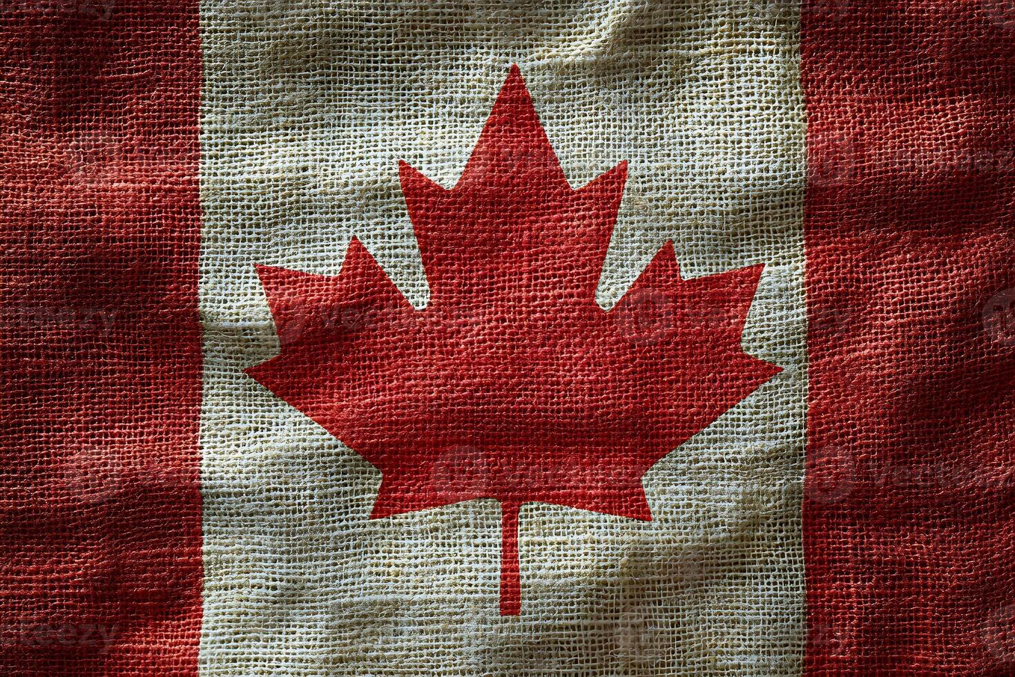 Canadian Flag on Burlap Texture for Patriotic and Rustic Design Themes photo