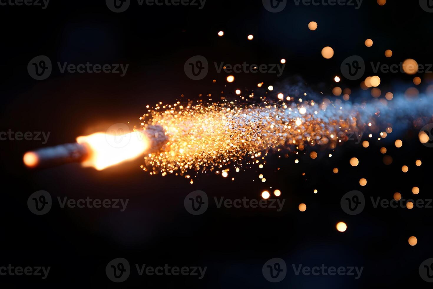 Sparkling Firework Fuse Exploding in Dark Background Perfect for Celebration Themes photo