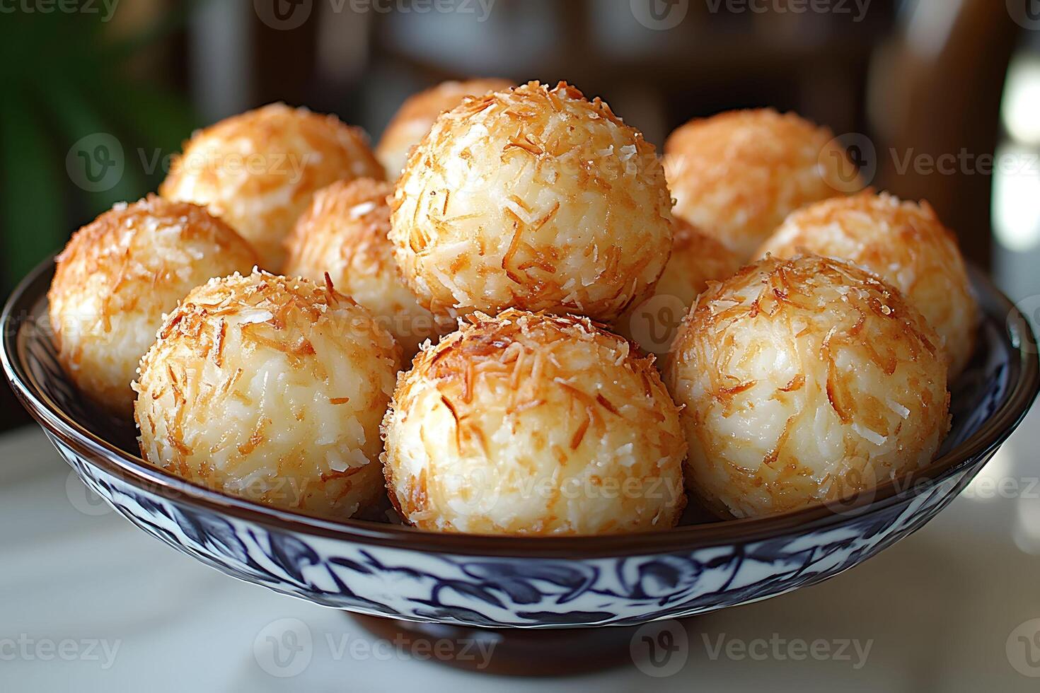 Delicious Coconut Rice Balls in Vintage Ceramic Bowl for Culinary Display photo