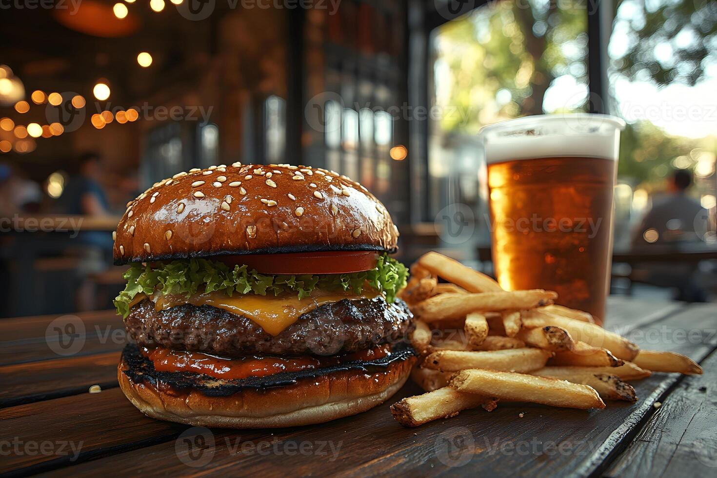 Juicy Cheeseburger with Fries and Beer in Rustic Restaurant Setting photo