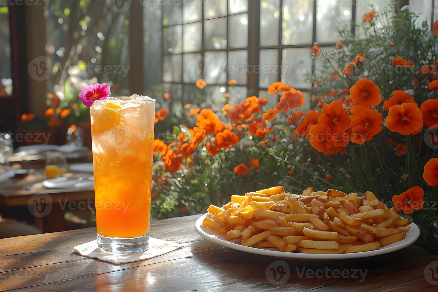 Refreshing Summer Beverage with Bright Flowers and French Fries for Dining Ambiance photo