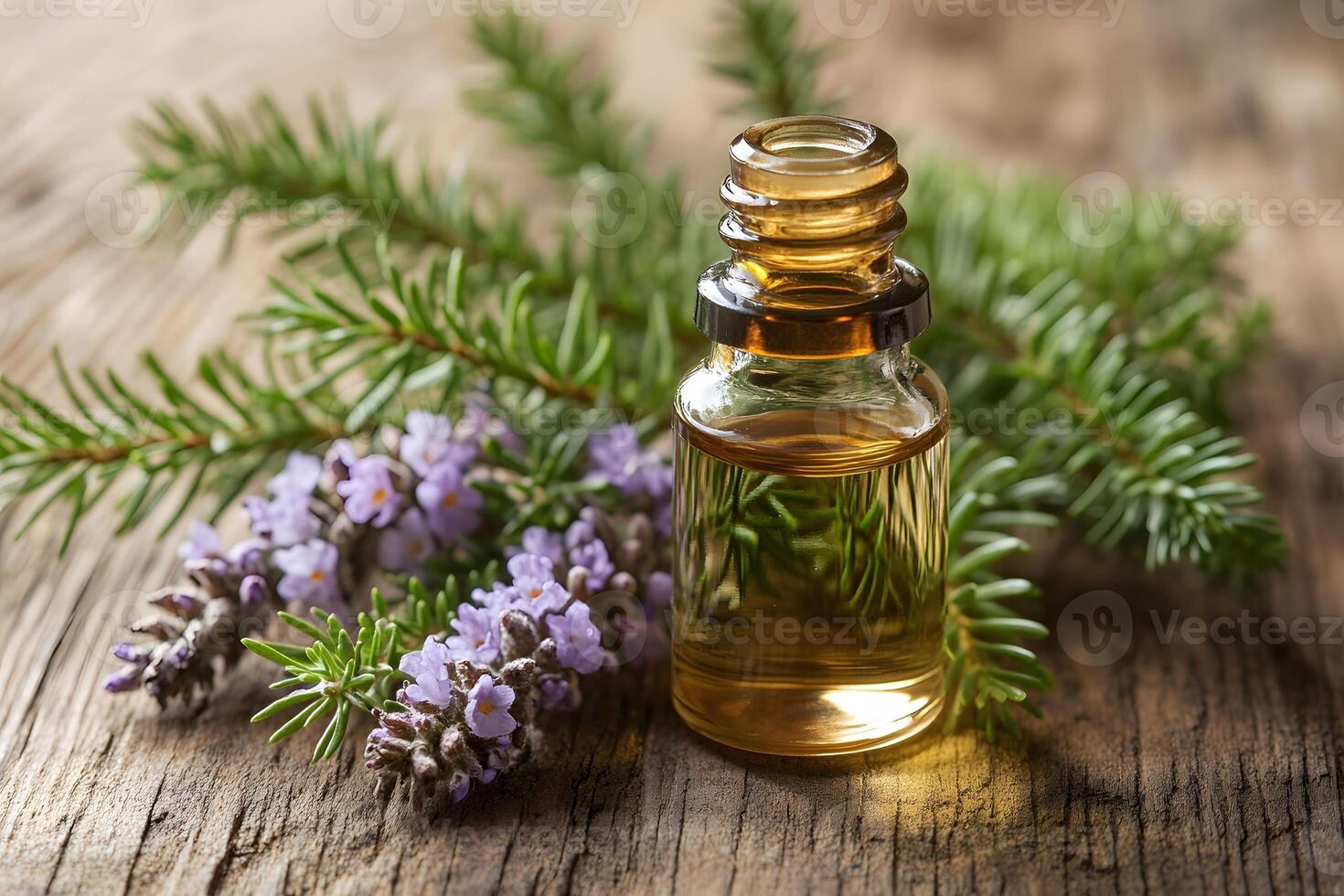 Essential Oil Bottle with Lavender and Pine on Rustic Wood for Aromatherapy photo
