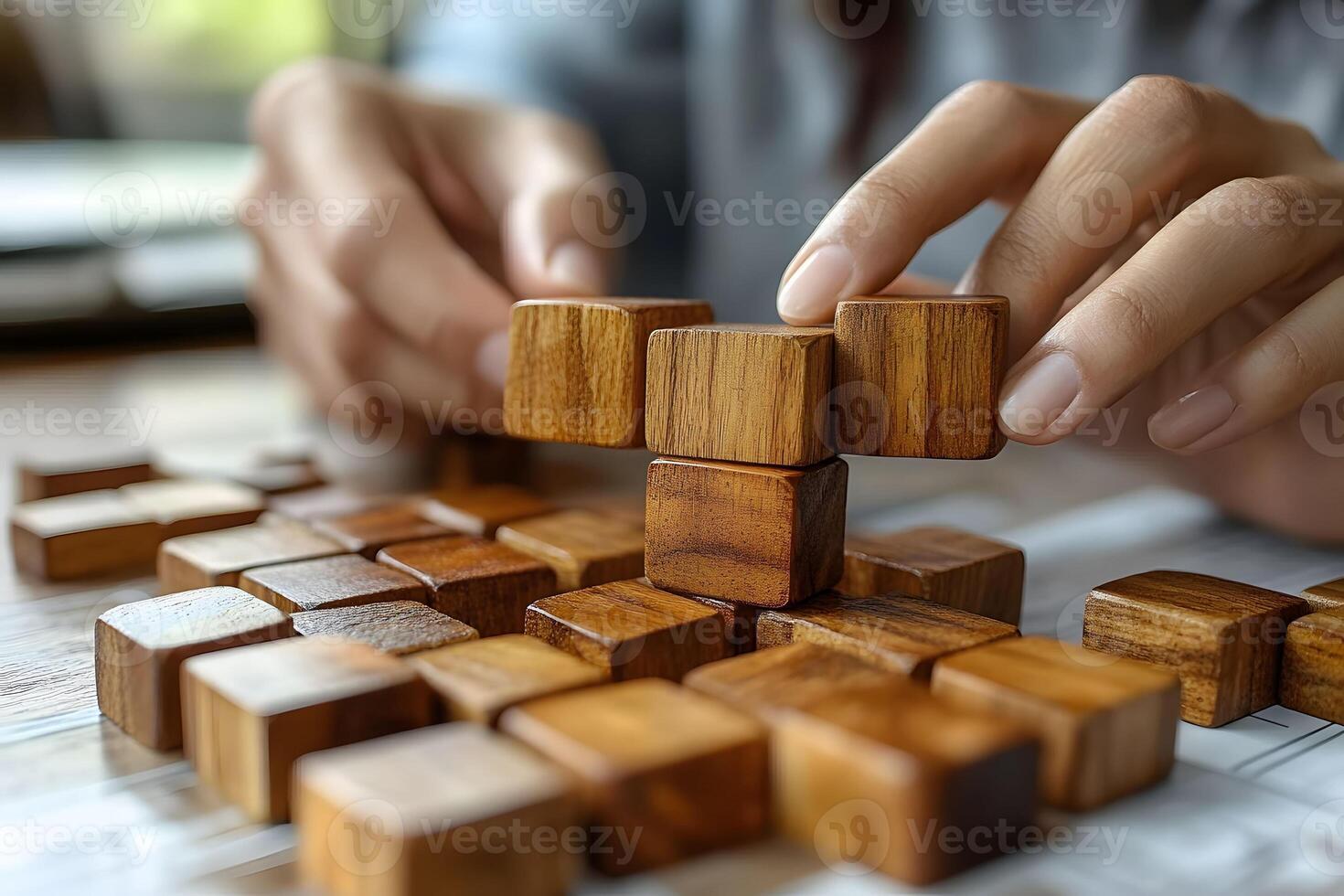 Teamwork and Strategy Building Success with Wooden Blocks for Business Concepts photo