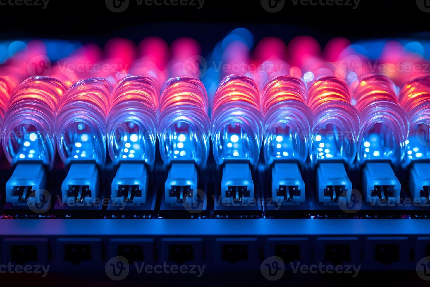 Close-Up of Fiber Optic Cables with Glowing LED Lights in a Data Center Setting photo