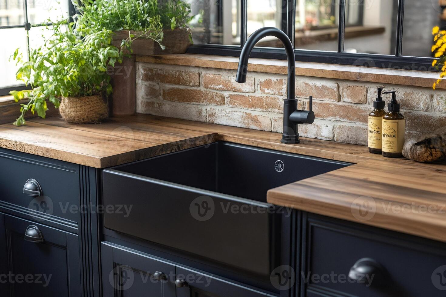 Modern farmhouse kitchen showing black ceramic sink and wooden countertop photo