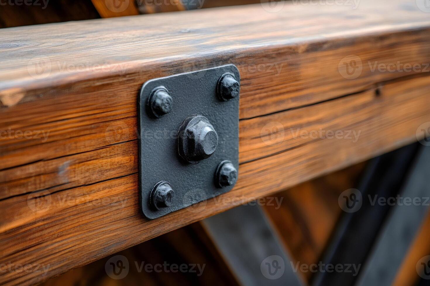 Large wooden beam connected by metal plate and screws, displaying construction detail photo