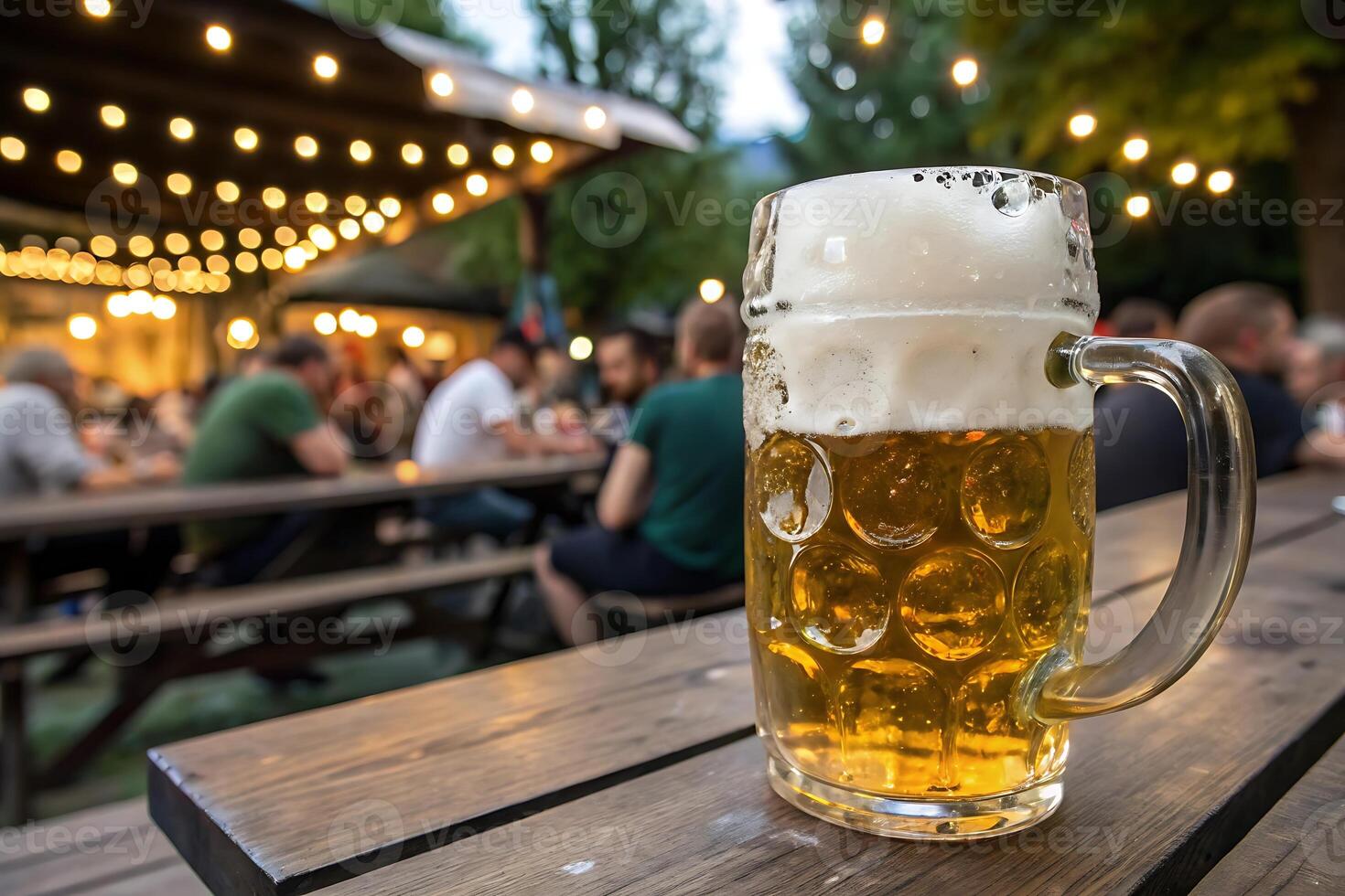 Close-up of Large Beer Mug Filled with Golden Beer photo