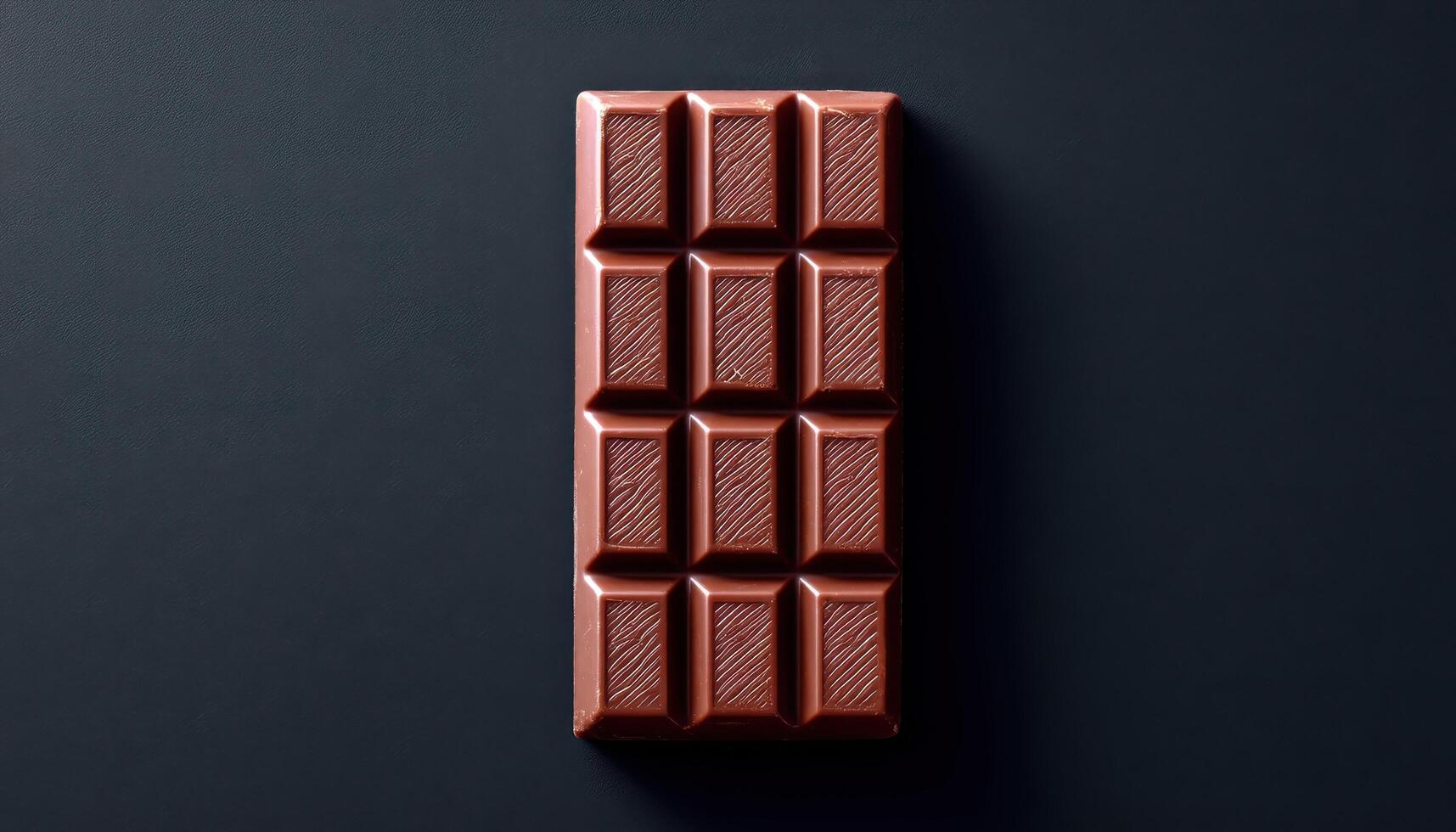 Minimalist chocolate bar display on dark surface food photography modern design aesthetic photo
