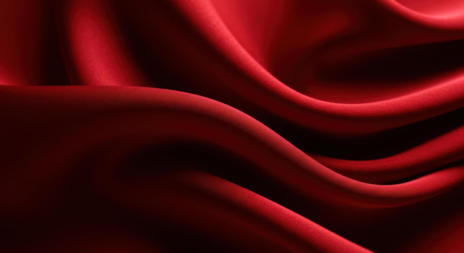 Luxurious crimson fabric with captivating curves and intricate shadows photo