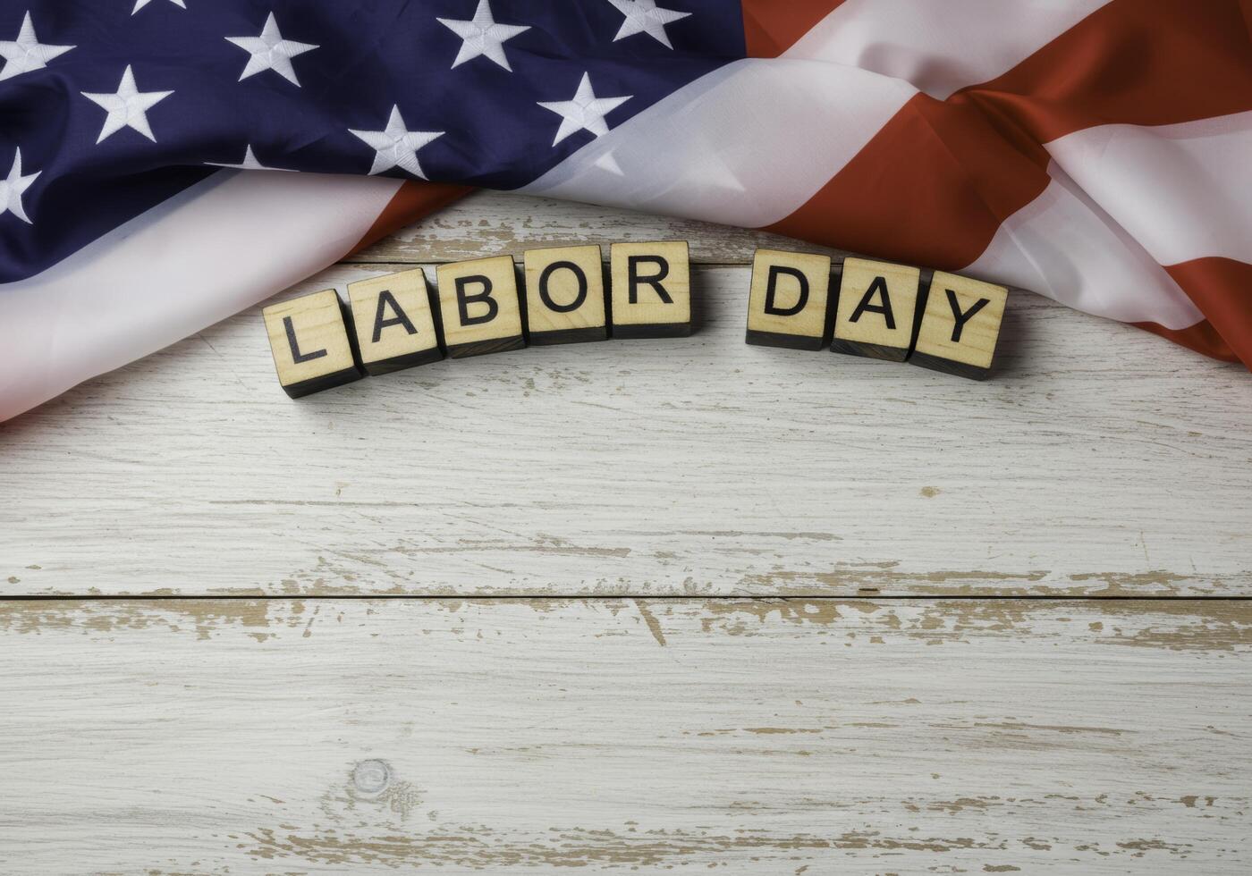 American Labor Day Celebration Wooden Blocks and US Flag on Rustic Table photo