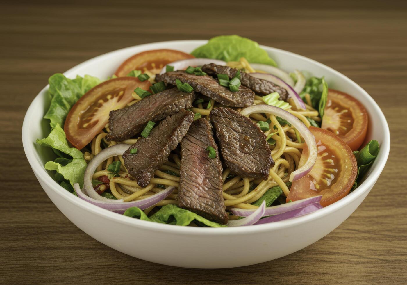 Delectable noodle salad with grilled beef, sliced tomatoes, and crisp red onions photo