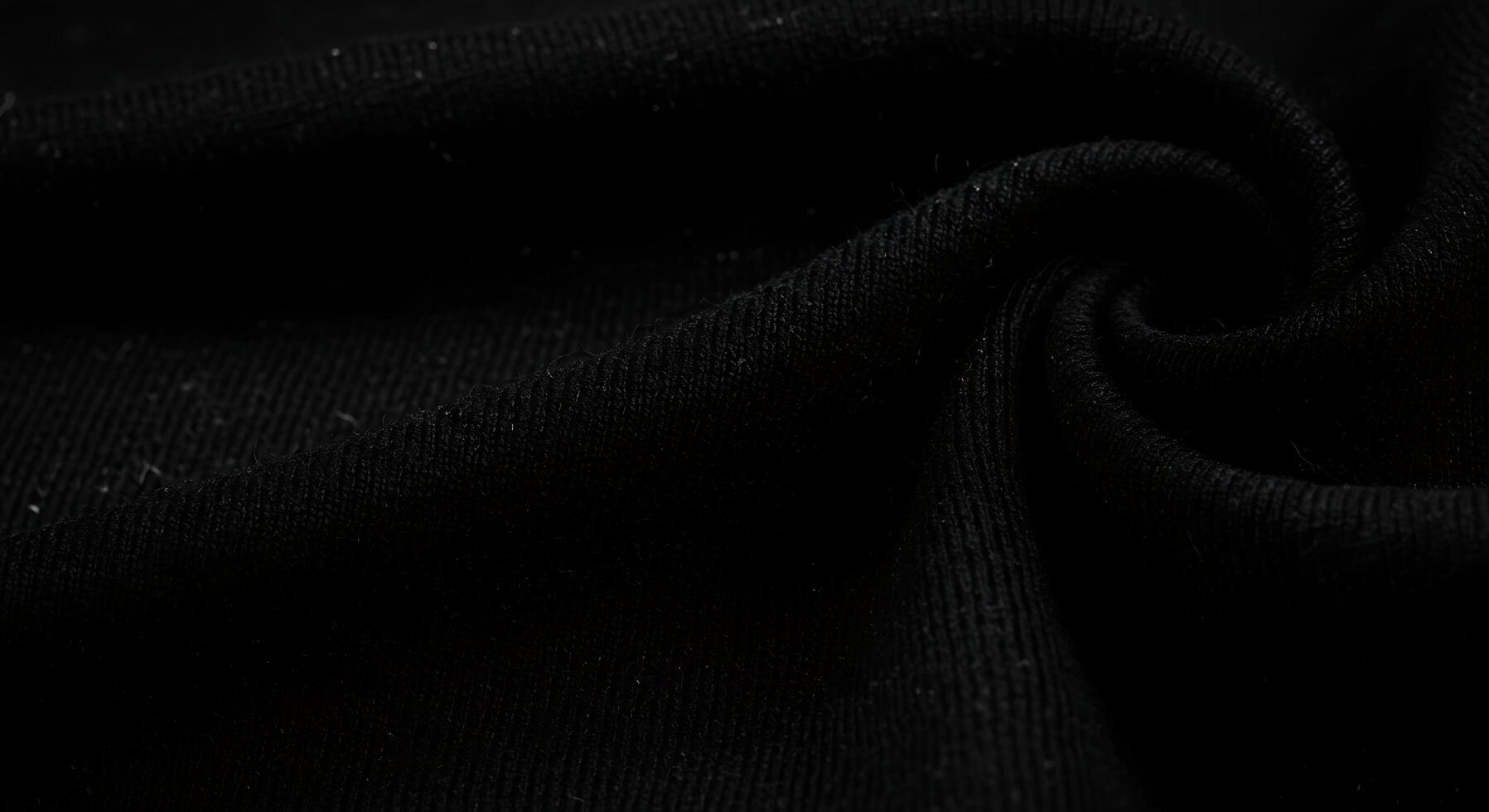 Close-up of Black Knitted Fabric with Subtle Texture and Gentle photo