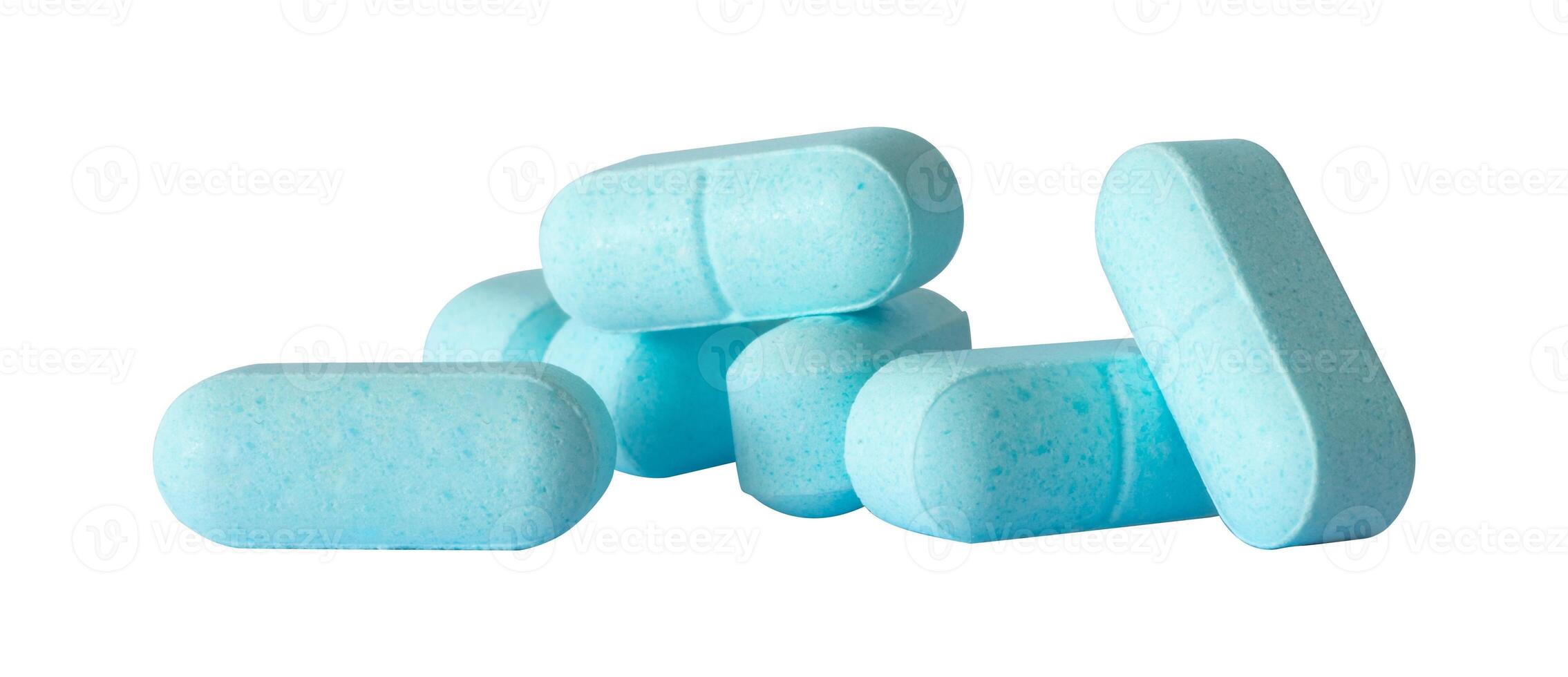 pile of medical blue drug capsules photo
