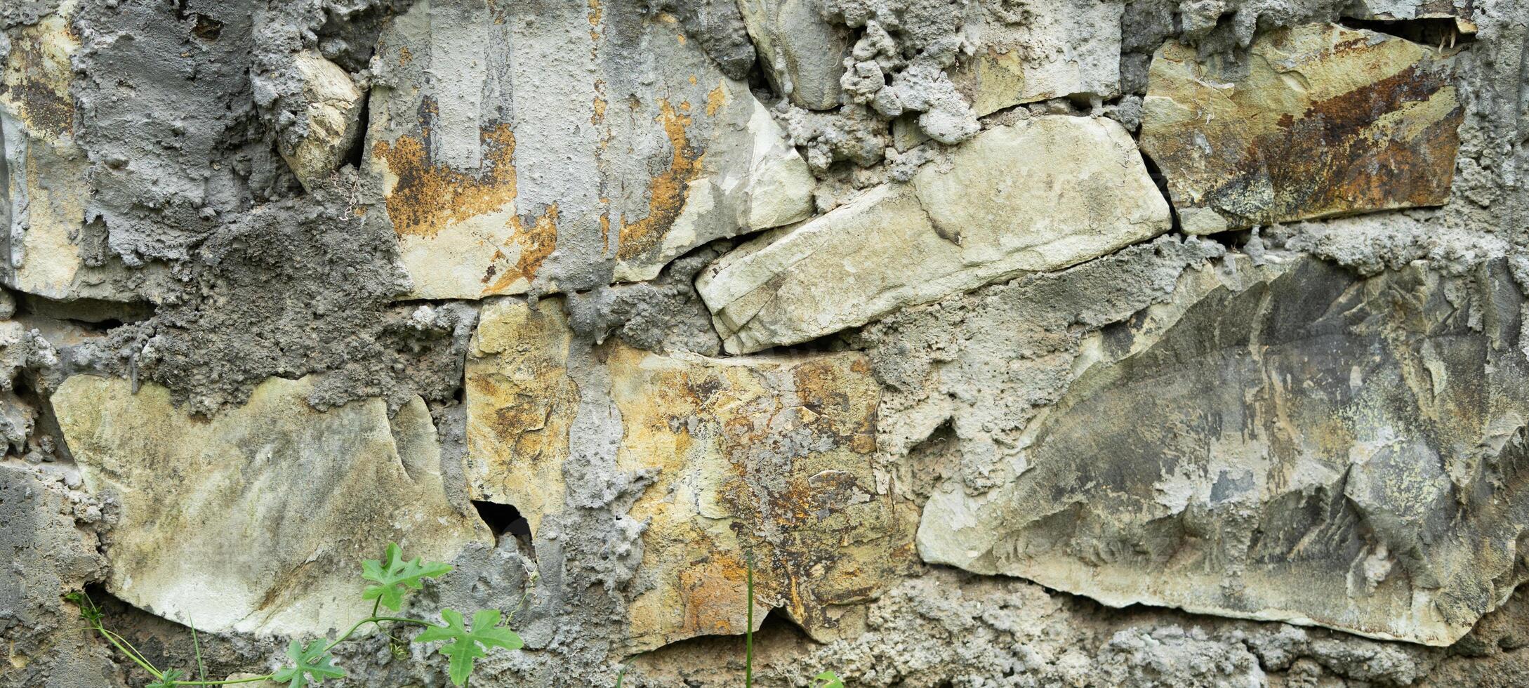 strong stone fence wall texture background photo