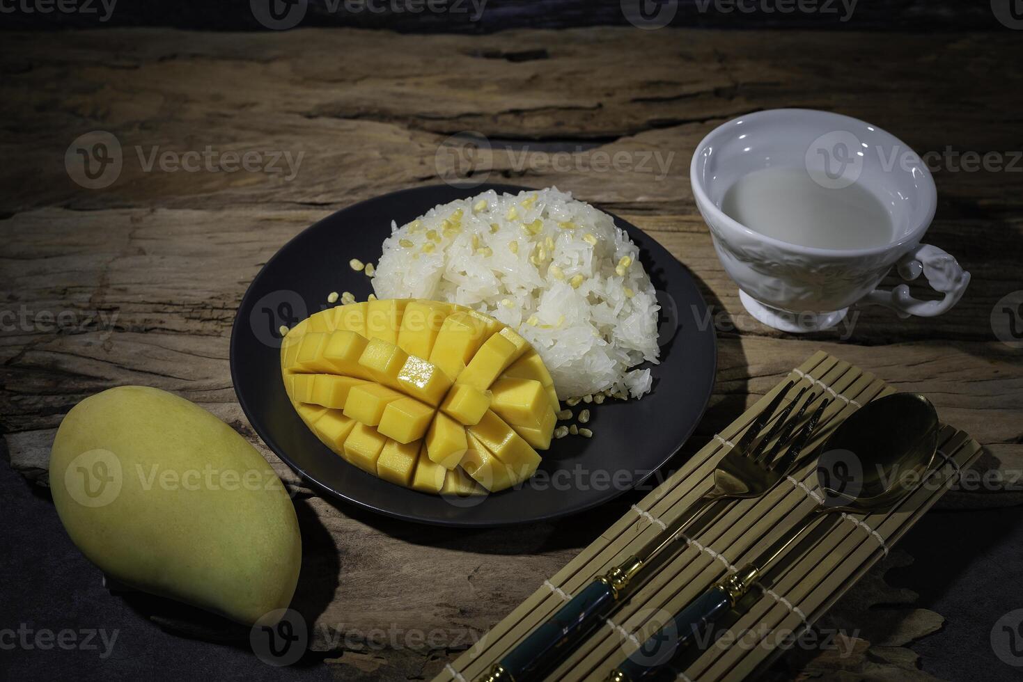 Thai food, street food, sticky rice and ripe mango, delicious and very popular. photo