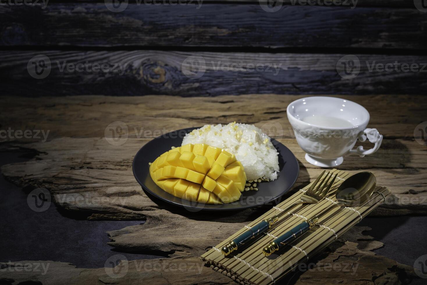 Street food, sticky rice with mango, Thai food, good taste, Asian food, very popular. photo