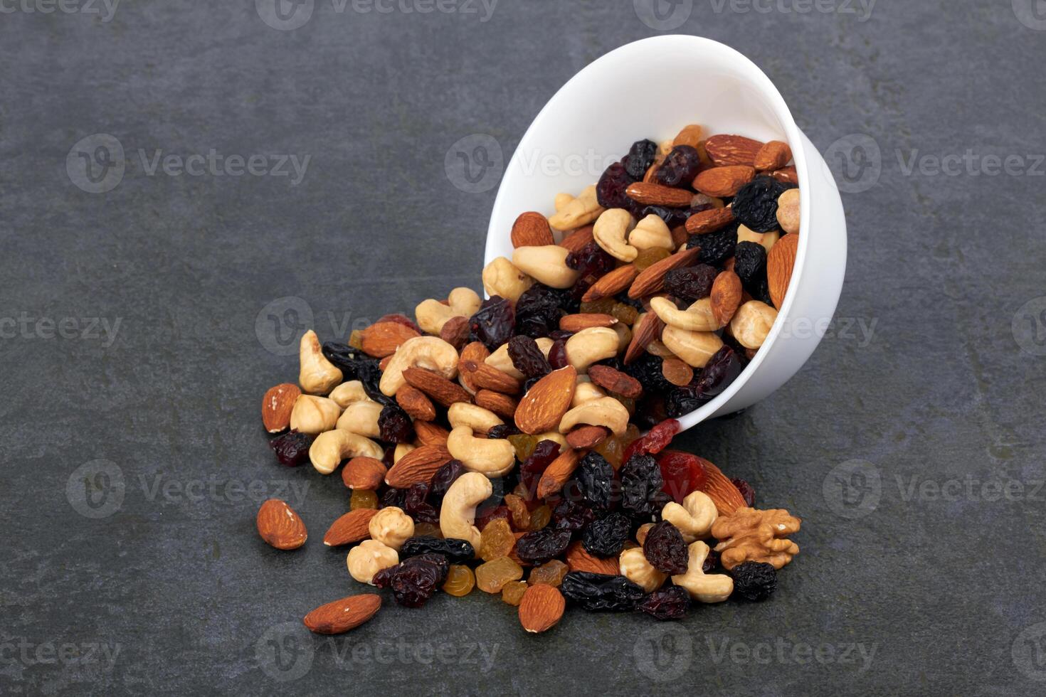 Bowl of mix nuts as a background photo