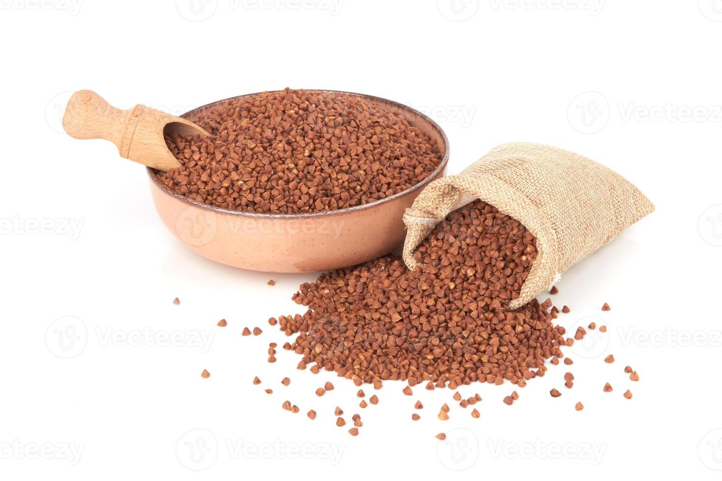 Raw buckwheat isolated on white photo