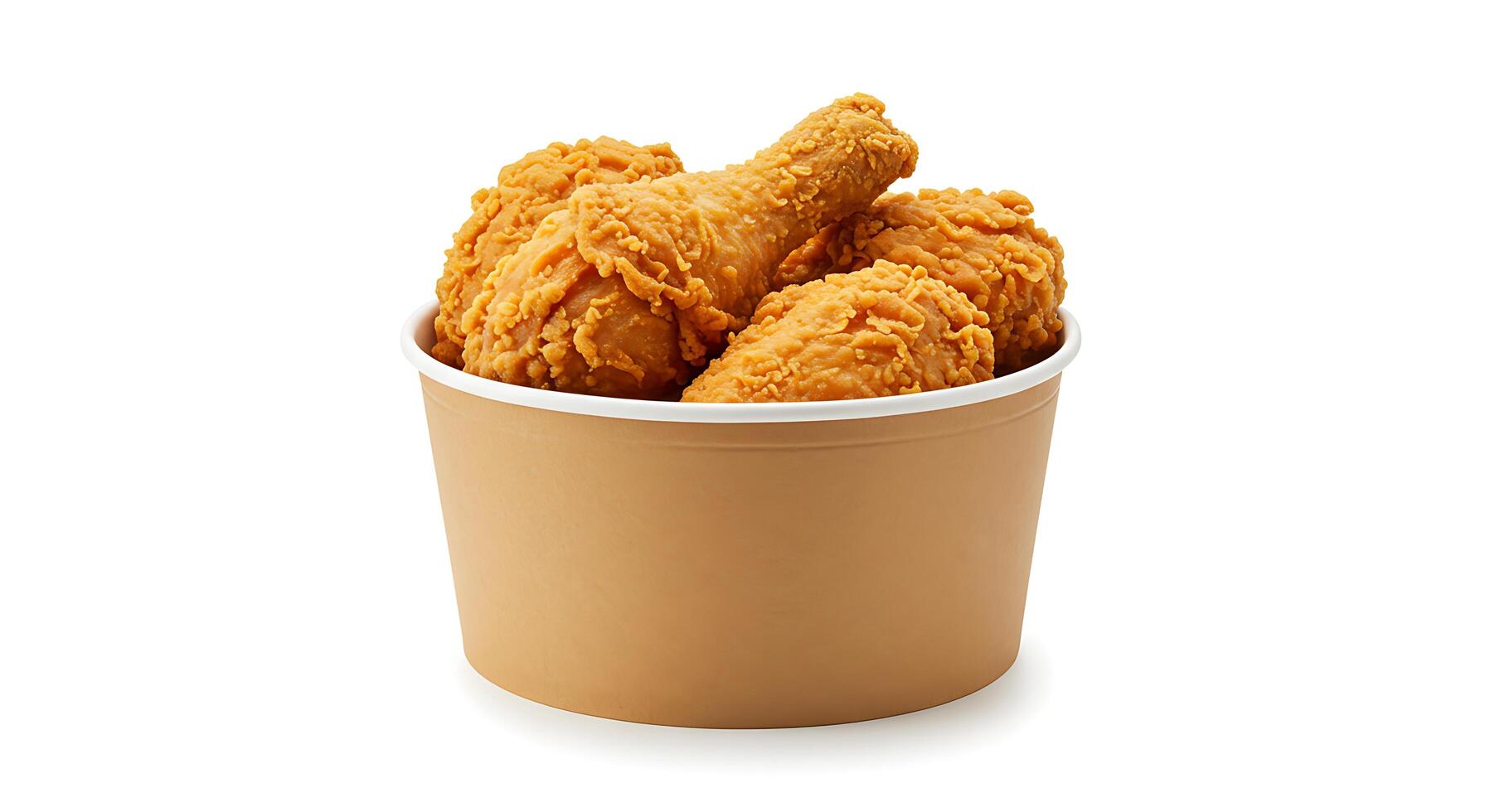 A bucket of fried chicken sitting in a white container photo