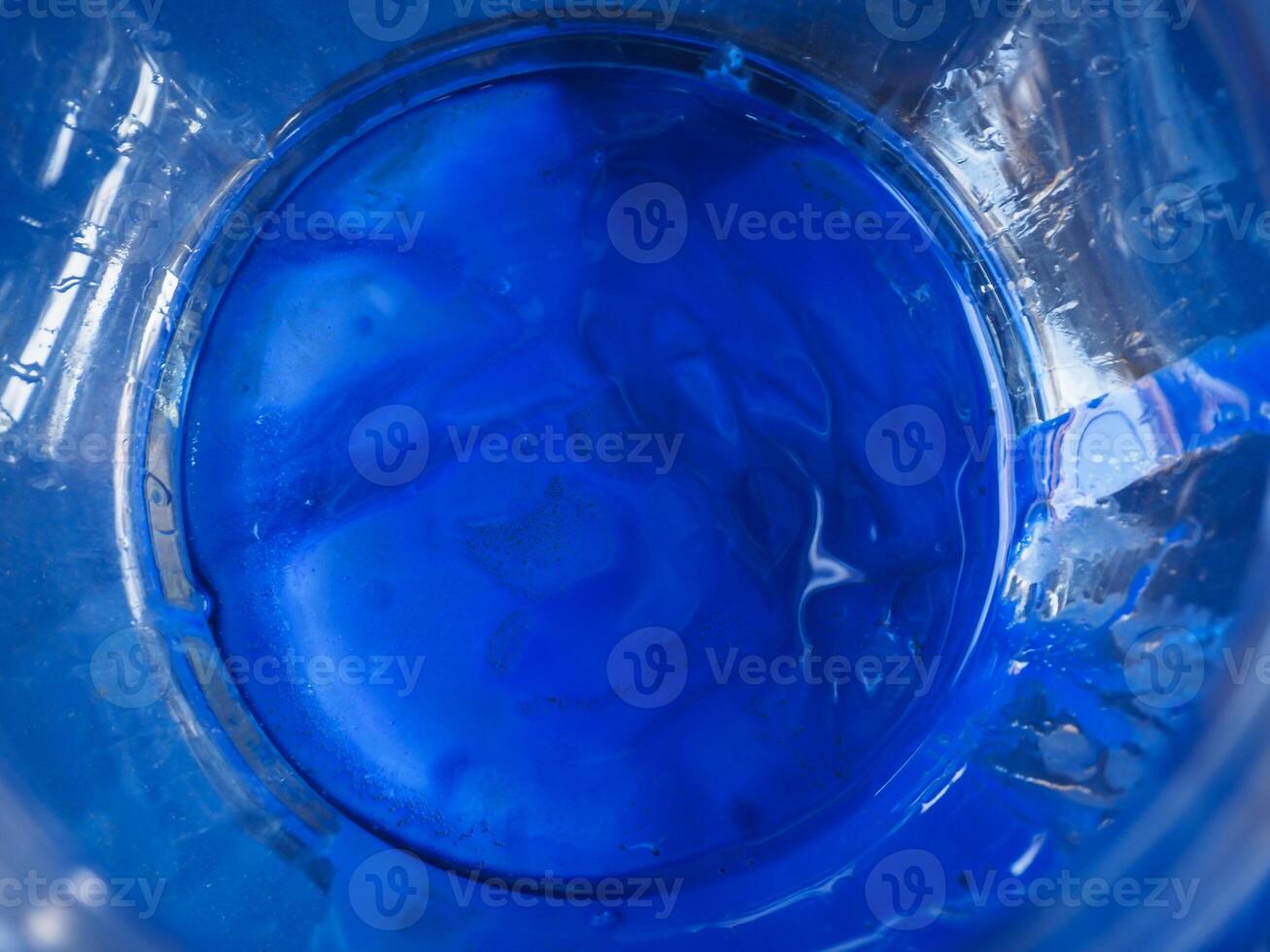 Blue watercolor in broken glass for texture abstract art photo