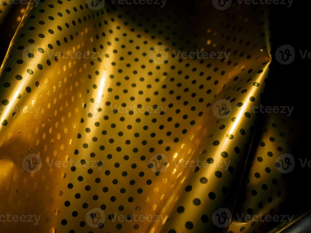 Gold plate texture with dots and reflection at night for luxury vintage background. photo