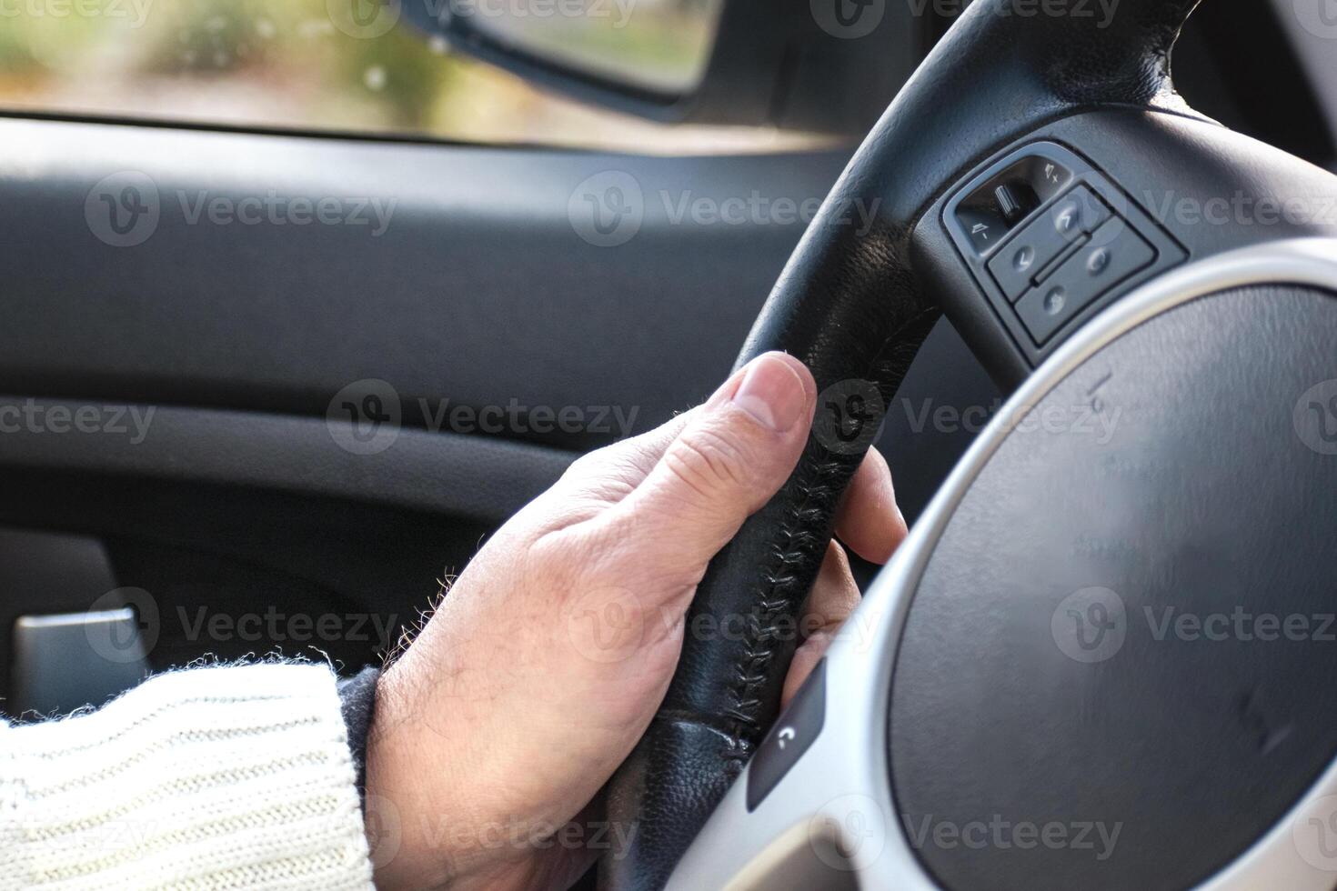 View on driver area from car interior, active photo