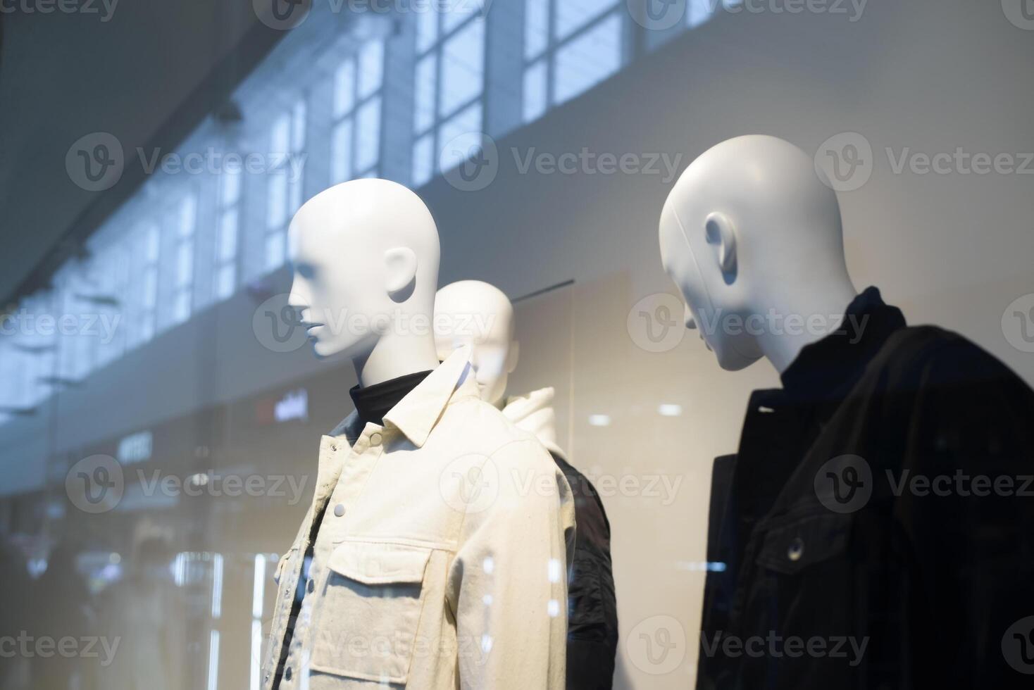 Mannequins in a window display photo