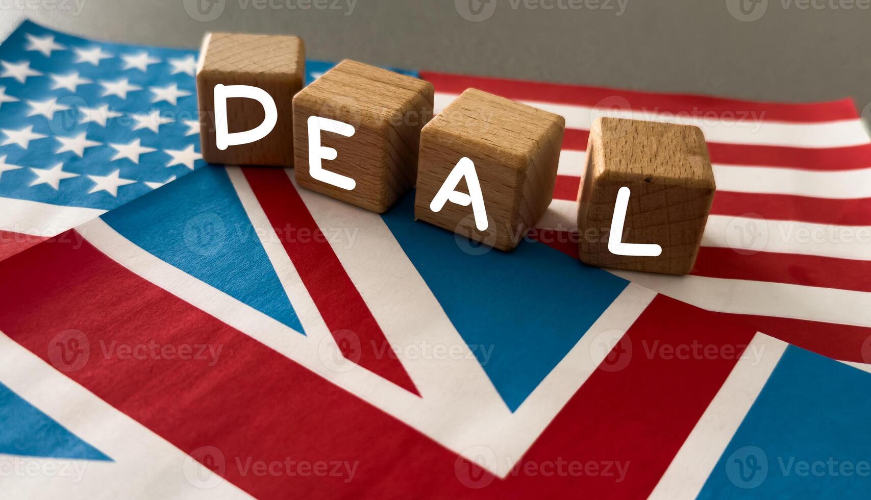 Political flags of United Kingdom and United States of America on table. concept of negotiations, collaboration and cooperation of countries. agreement between the governments. photo