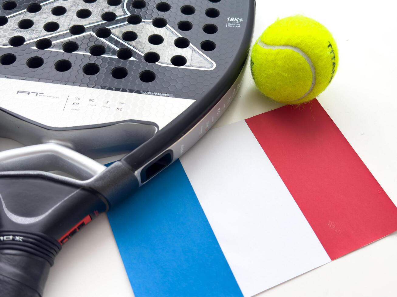 Kyiv, Ukraine, July 27, 2024. Padel tennis racket nox and flag photo