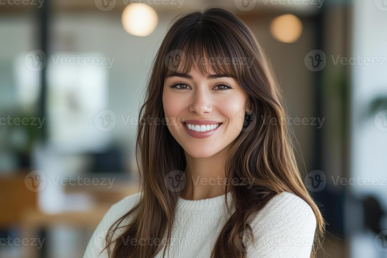 Portrait of a smiling woman in a bright and stylish environment photo