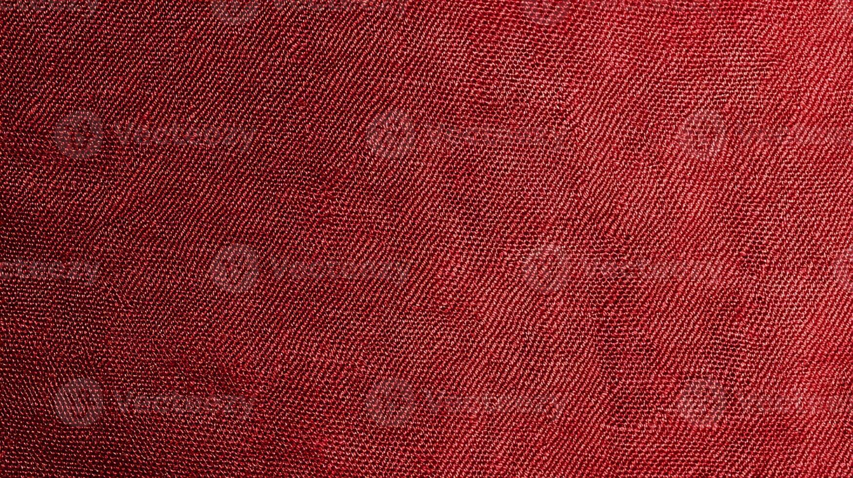 Close-up of Red Fabric Texture with Elegant Woven Pattern photo