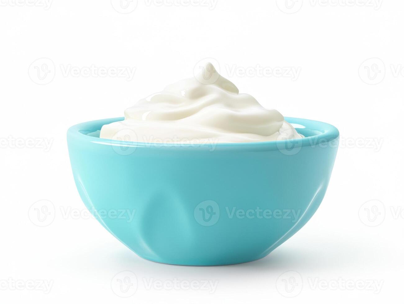 Creamy white substance in a turquoise bowl on a plain background photo