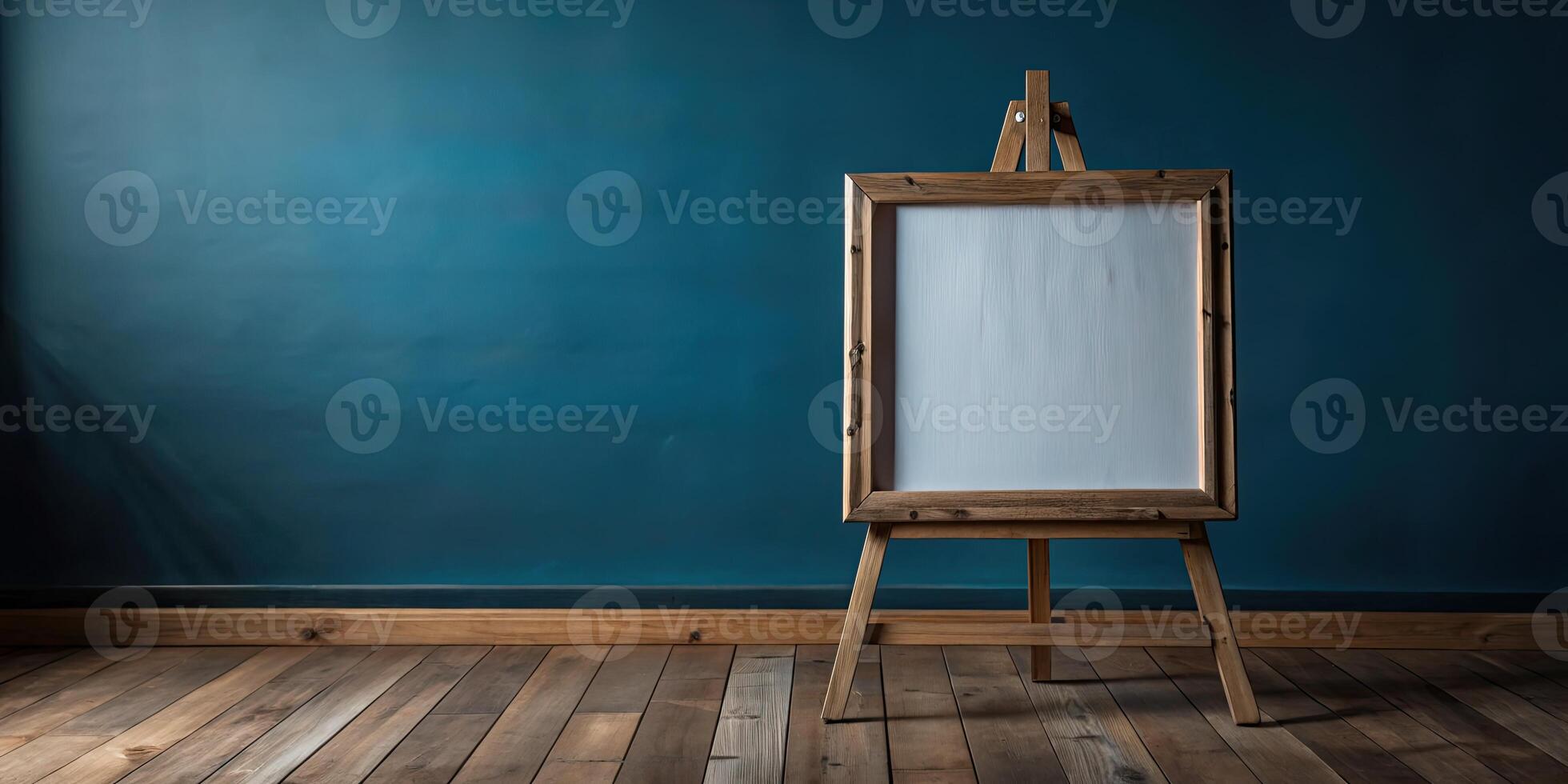 Blank canvas on an easel in an art studio. photo