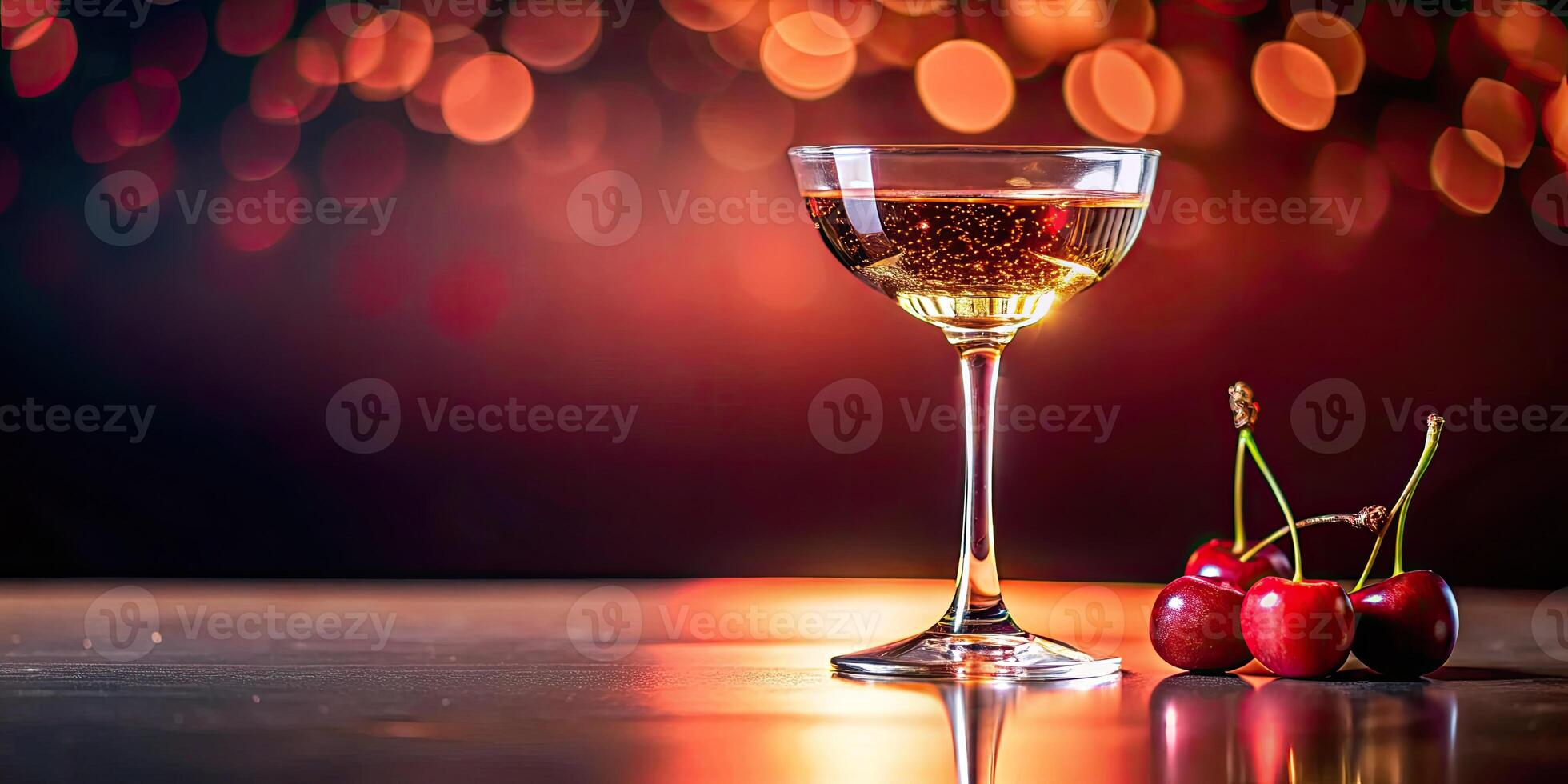 Elegant cocktail glass with cherries against a festive backdrop. photo