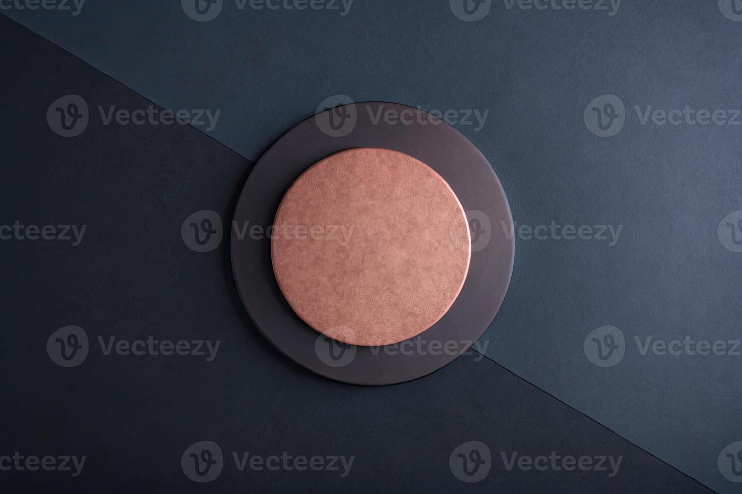 Copper-colored circle on a dark geometric background. photo