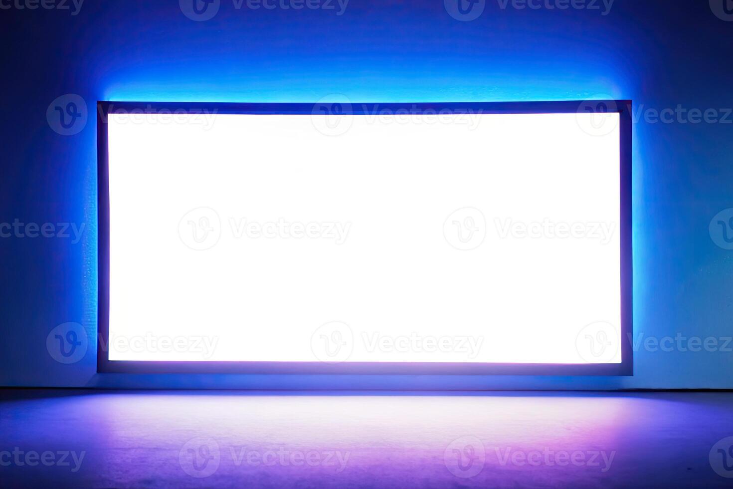 Large illuminated screen casting a blue glow. photo