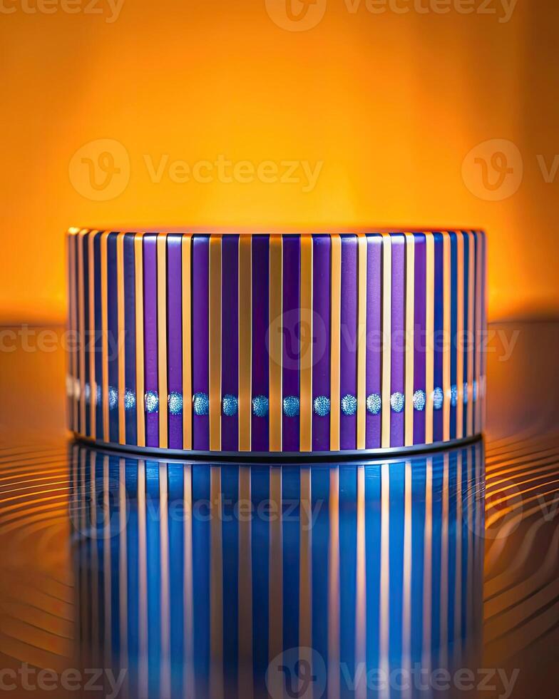 Striped cylindrical decor piece against a vibrant background. photo