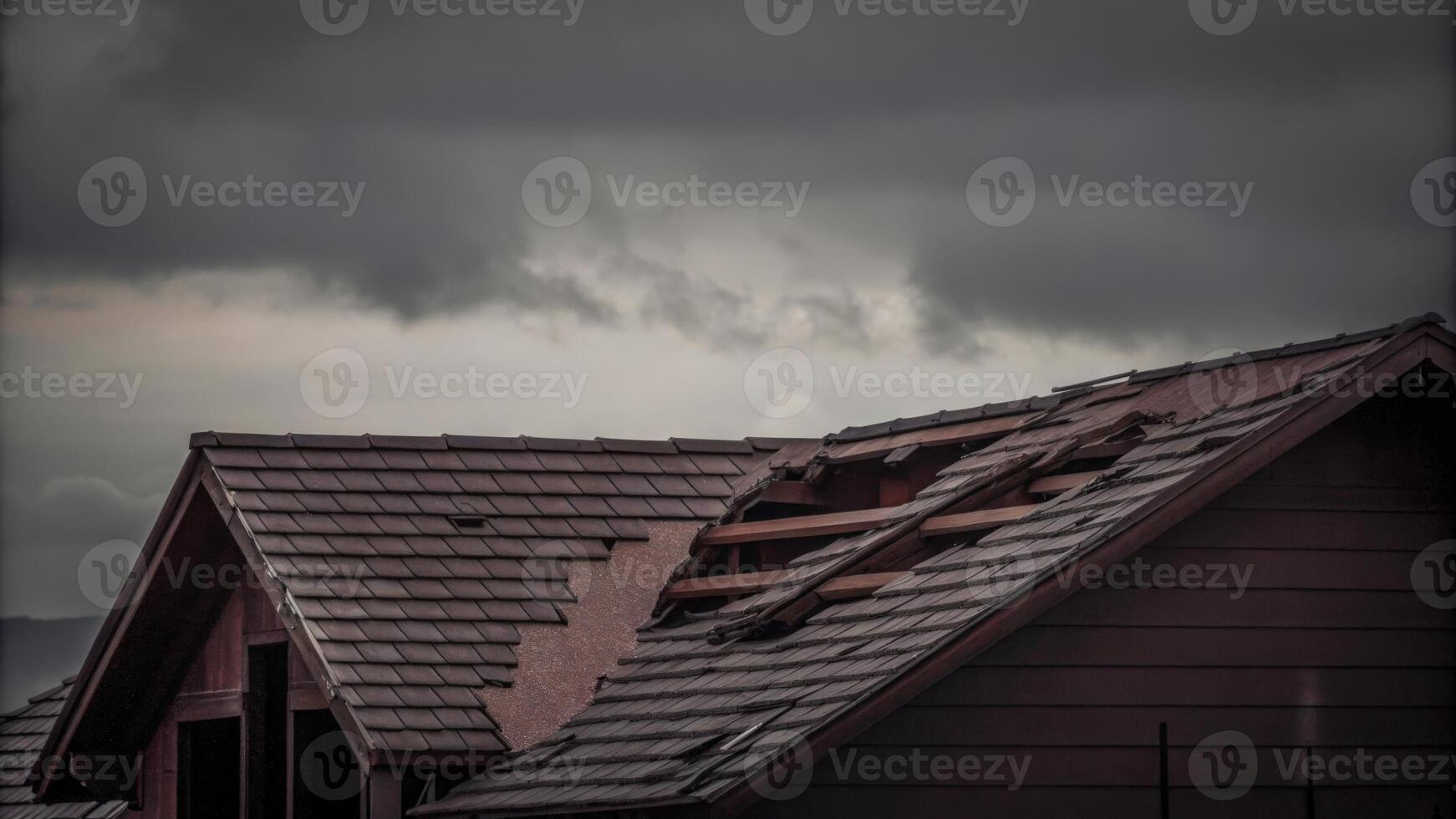 Damaged Roof of a Residential House Under Cloudy Skies photo