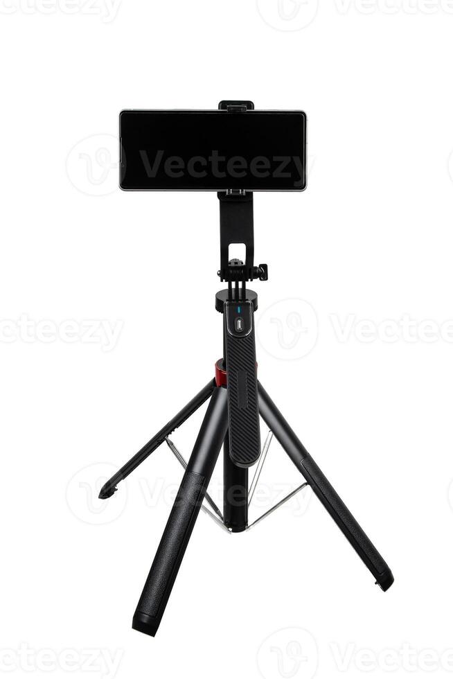 A tripod designed for smartphones, featuring an adjustable mount and a Bluetooth shutter for convenience. photo