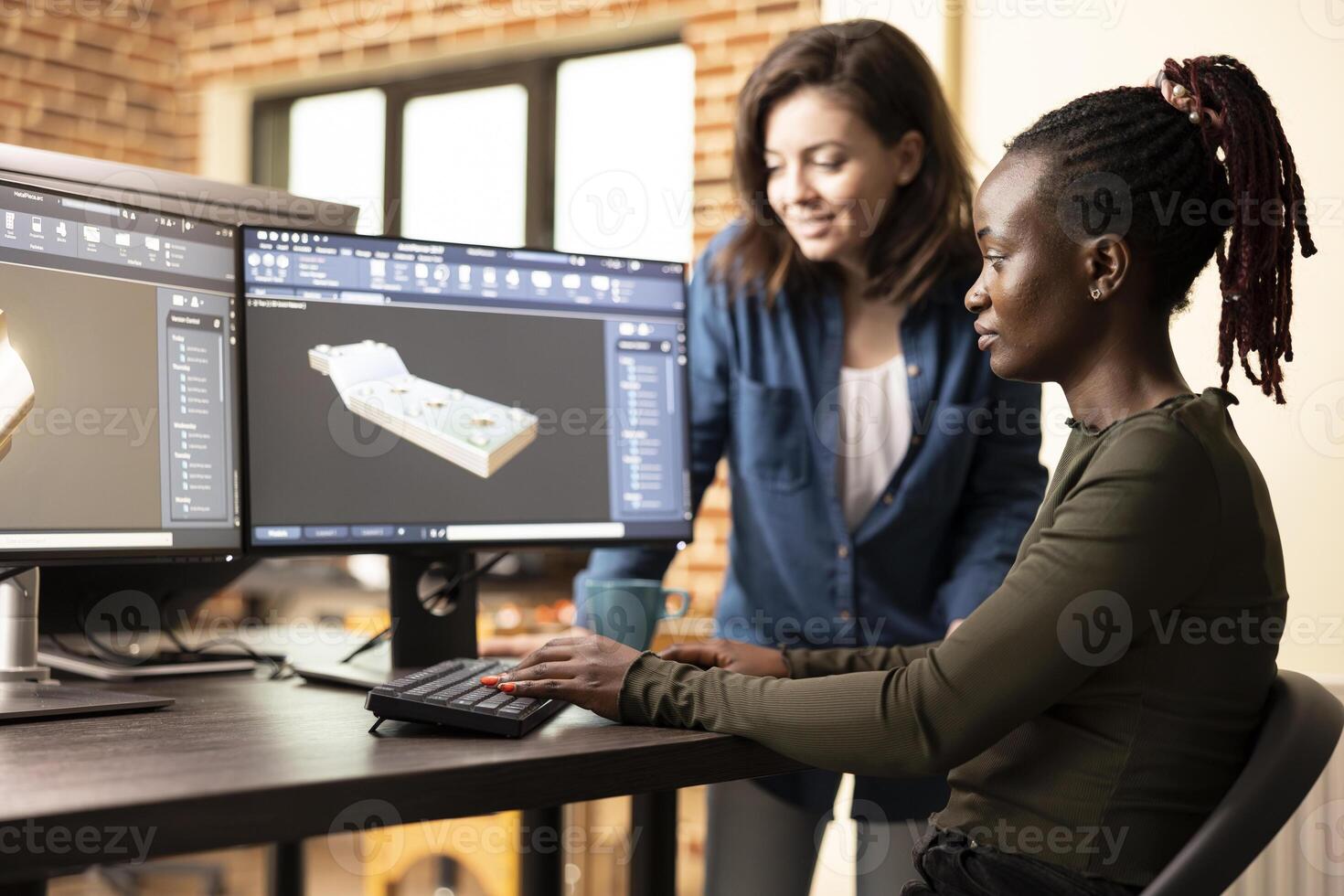 African american artist discussing geometry error with coworker, working together in fixing technical problem. Caucasian team leader identifying a mesh issue and guiding a colleague on the solution. photo