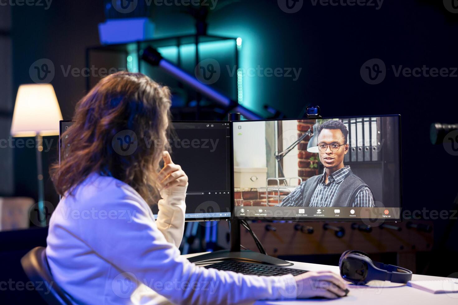 Computer science teacher doing online tutoring, telling student in online videocall about ways to fix computing bugs. IT professional teaching disciple in webinar how to do programming photo