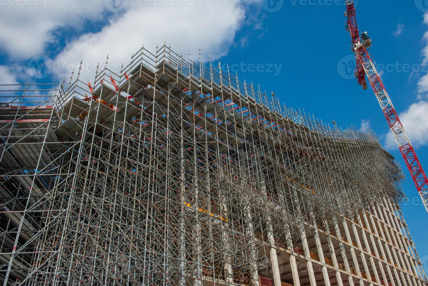 Scaffolding for the construction of a new wave-shaped building in CityLife photo