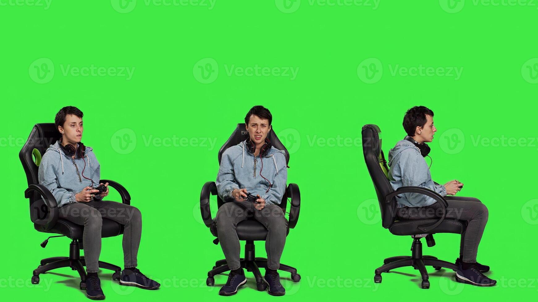 Gamer feeling angry about losing games competition against greenscreen, playing on console with controller and gaming setup. Irritated displeased woman lost shooter action. Camera A. photo