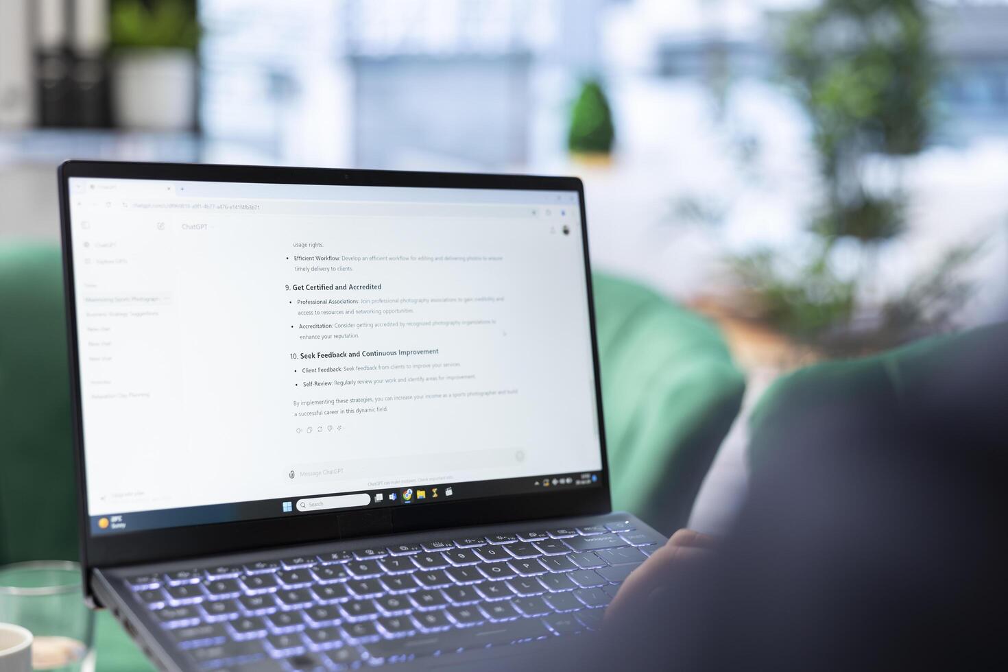 Bucharest, Romania - July 30th 2024 - Manager writes prompt on AI chatbot system to automate workflow at corporate office. Leader uses the chat GPT virtual web assistant for smart automation. photo