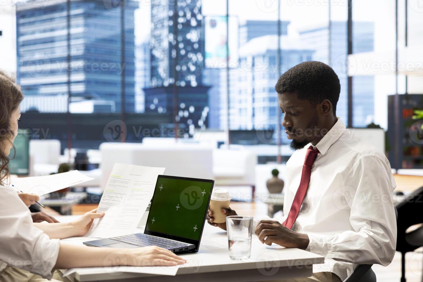 HR experts look at CVs on isolated screen laptop to vet selected applicants and ensure their skills match role needs. Headhunters read resumes on mockup notebook, assessing candidate work experience photo