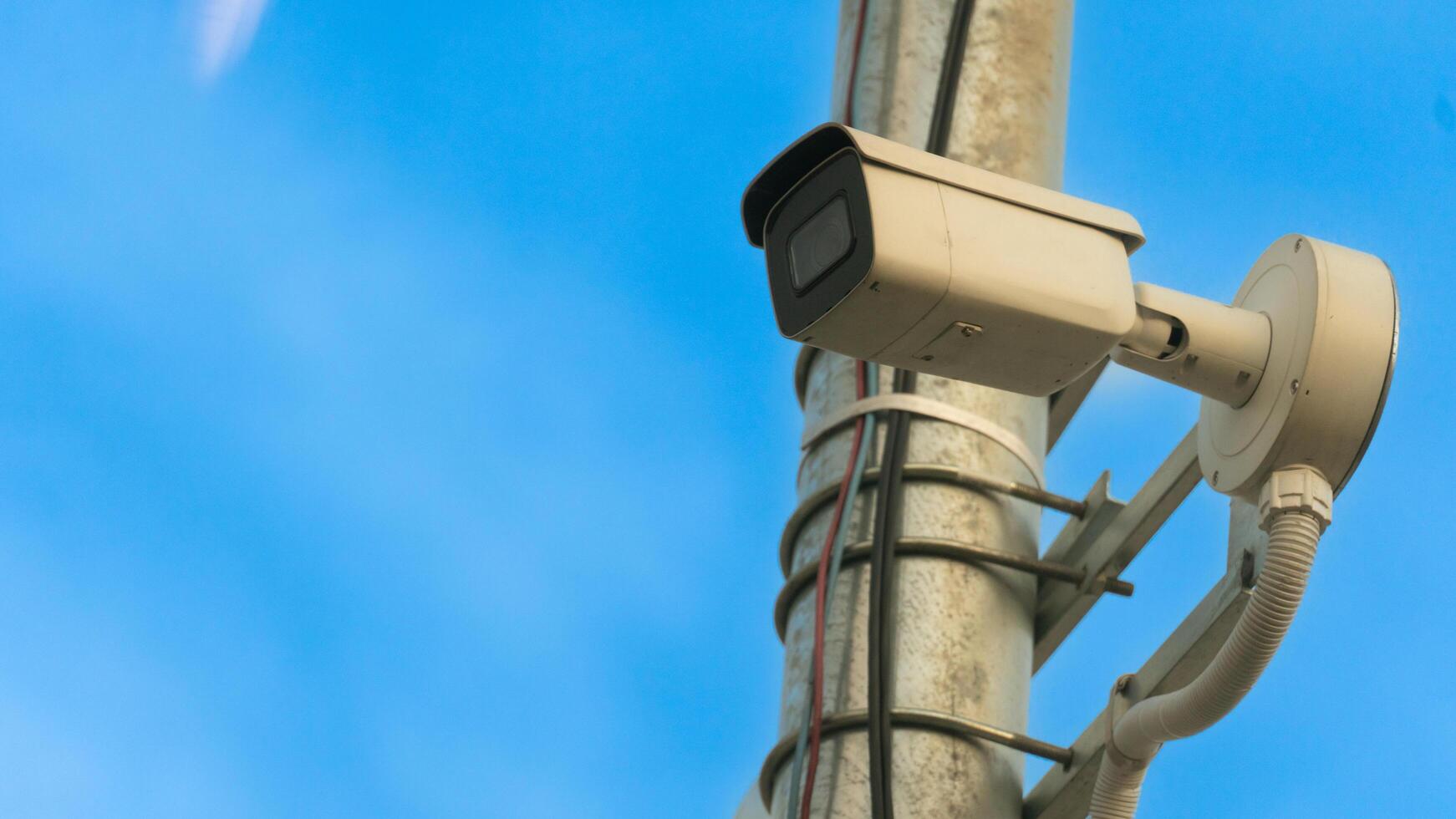 CCTV camera type outdoor install on the electric city. Camera install on the pole by steel on time photo